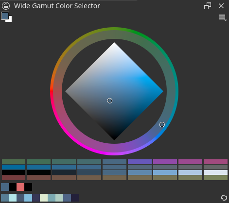 El selector de colors de gamma àmplia es mostra ací com un quadrat amb degradat amb un cercle de color de l'arc de Sant Martí al seu voltant.